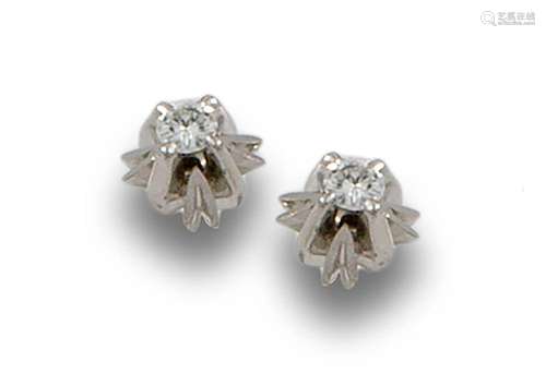 18 kt white gold sleeper earrings.