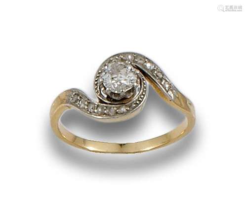 14 kt yellow gold antique solitaire ring.