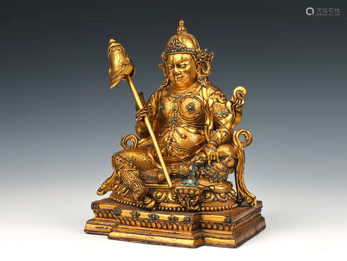 A gilding copper buddha statue