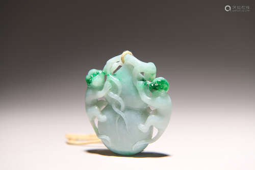 A jadeite monkey pendant