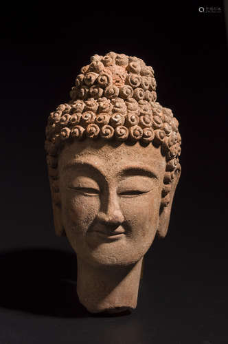 A sandstone buddha head