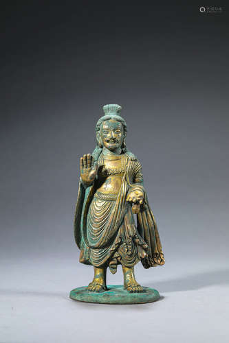 A gilding copper standing figurine