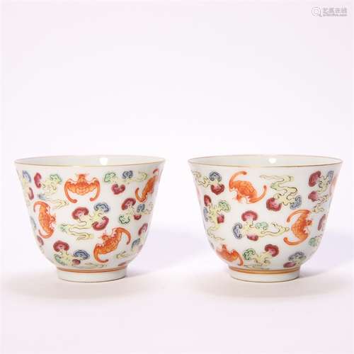 A pair of famille rose cloud and bat porcelain bowls