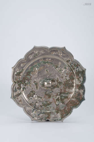 A bronze octagonal mirror