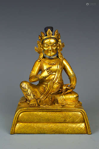 A gilding copper red Jambhala statue