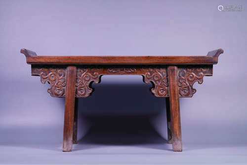 A chi dragon patterned fragrant rosewood table