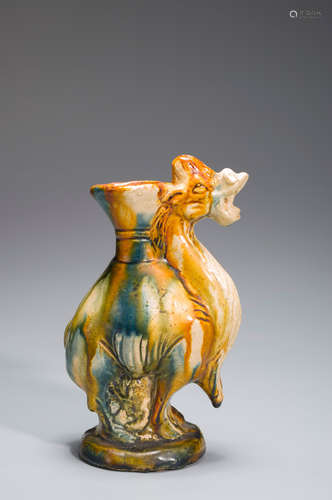 A tri-colored porcelain camel pot