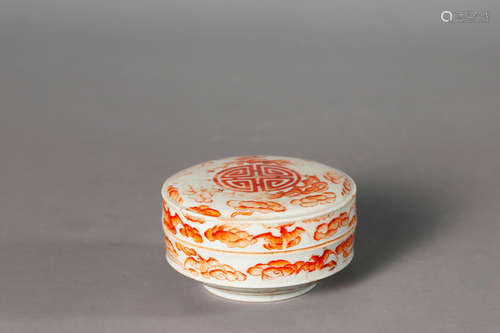 An iron red bat and peach porcelain box