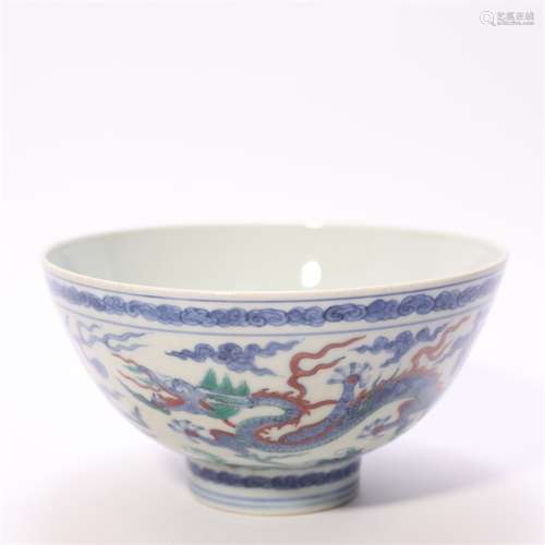 A blue and white multicolored dragon porcelain bowl