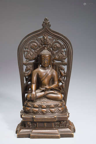 A copper buddha statue