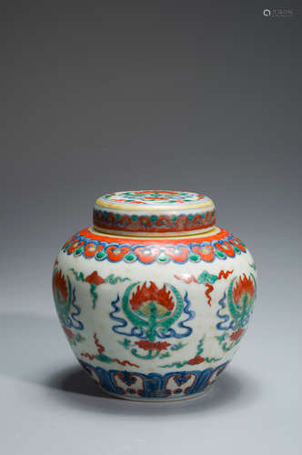 A multicolored flower porcelain covered jar