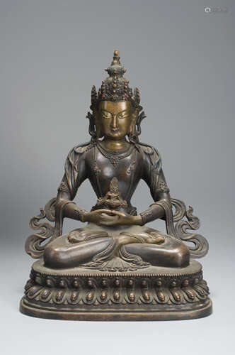 A copper Amitabha buddha statue