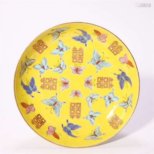 A yellow ground famille rose butterfly porcelain plate