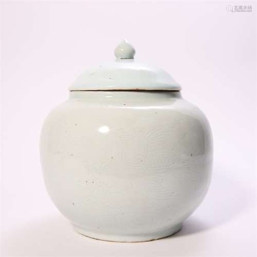 A phoenix carved green glazed porcelain jar