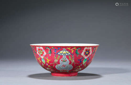 A red ground famille rose flower porcelain bowl