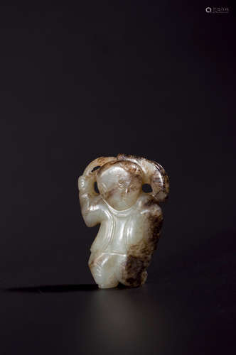 A tinged white jade figurine