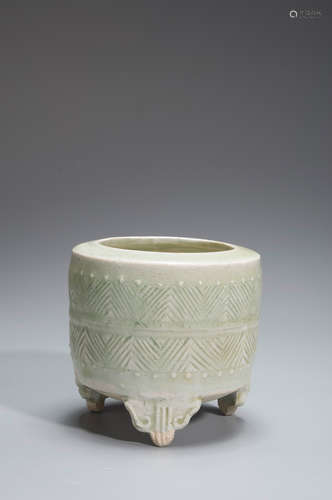 A celadon porcelain three-legged censer