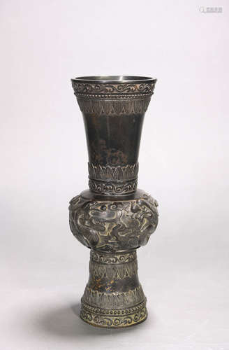 A bronze beaker vase