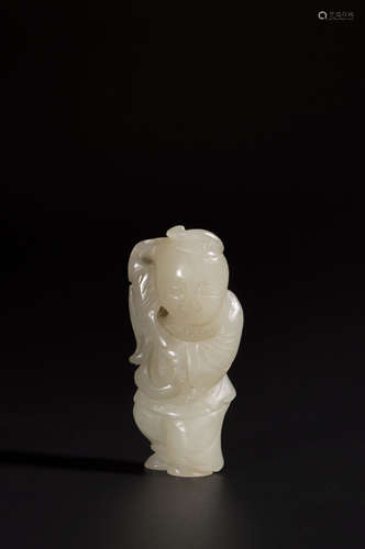 A white jade figurine with lotus