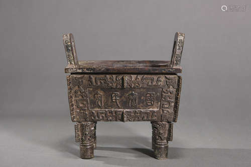 A bronze squared pot