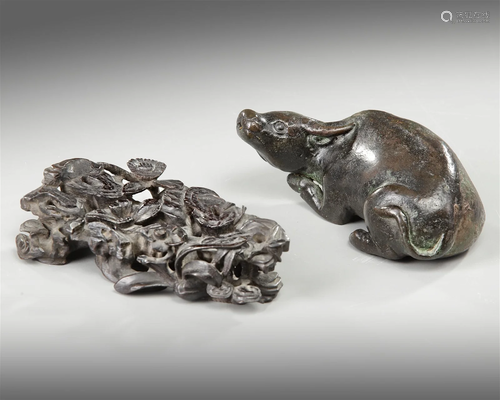 A CHINESE BRONZE BUFFALO ON A STAND, MING DYNASTY (1368-1644...