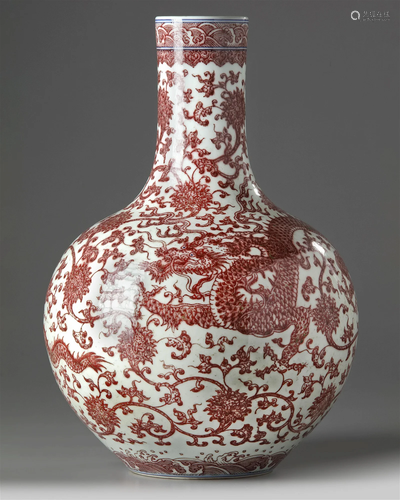 A CHINESE UNDERGLAZE COPPER-RED-DECORATED 'DRAGON'...