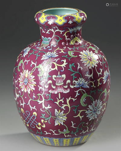 A CHINESE FAMILLE ROSE RUBY GROUND VASE 19TH/20TH CENTURY