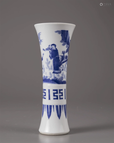 A CHINESE BLUE AND WHITE BEAKER VASE , 20TH CENTURY