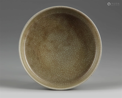 A CHINESE CELADON CRACKLE-GLAZED SHALLOW WASHER,QING DYNASTY...