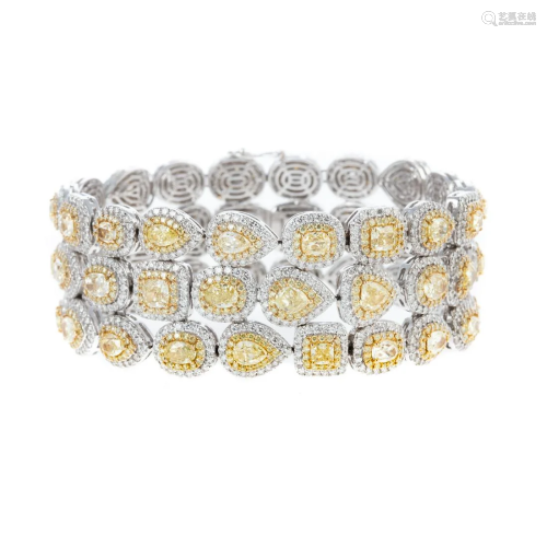 A 31.21 ctw Yellow & White Diamond Bracelet in 18K