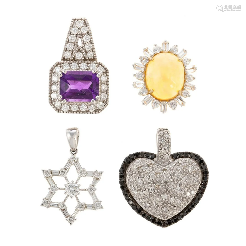 An Assortment of Gold Diamond & Gemstone Pendants