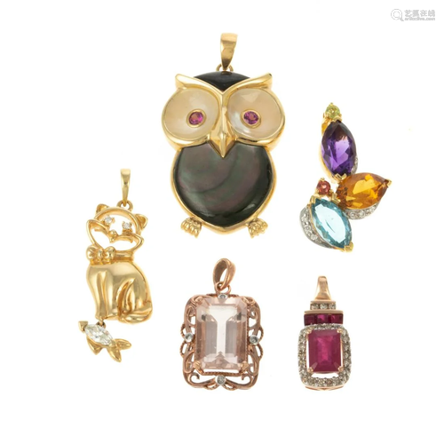 A Collection of Gold Gemstone & Animal Pendants