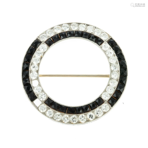 A Vintage Diamond & Black Onyx Circle Pin in Platinum