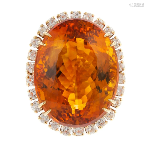 A Large Citrine & Diamond Halo Ring in 14K