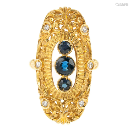 An Elongated Filigree Sapphire Ring in 14K