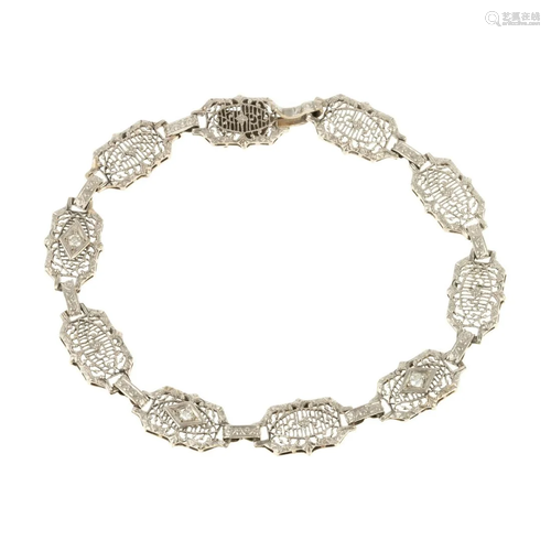 A Diamond Filigree Link Bracelet in 14K