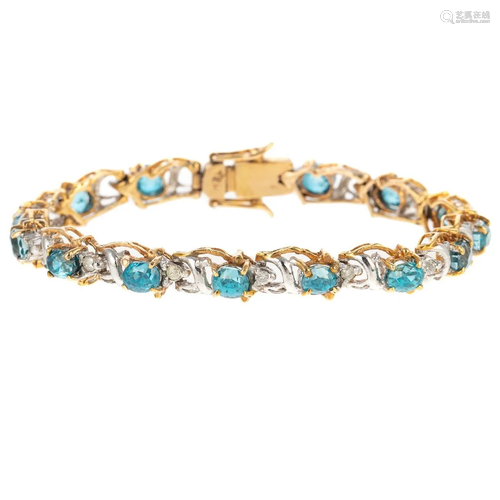 A Blue Topaz & Diamond Line Bracelet in 10K