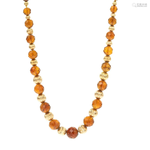 A Graduated Faceted Citrine & Gold Beaded Necklace