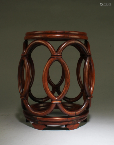 A Carved Wooden Display Stand