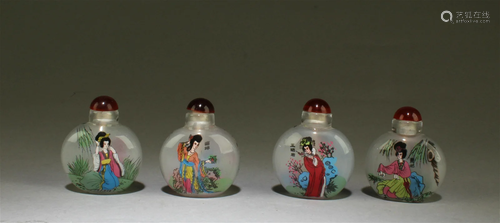 A Group of Four Peking Glass Snuff Bottles