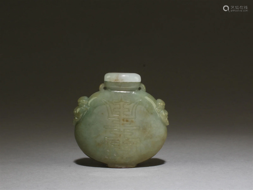 A Carved Jade Snuff Bottle