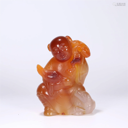 A Carved Agate Figurine