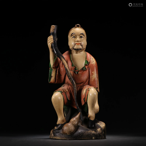 A Carved Zitan Arhat Figurine