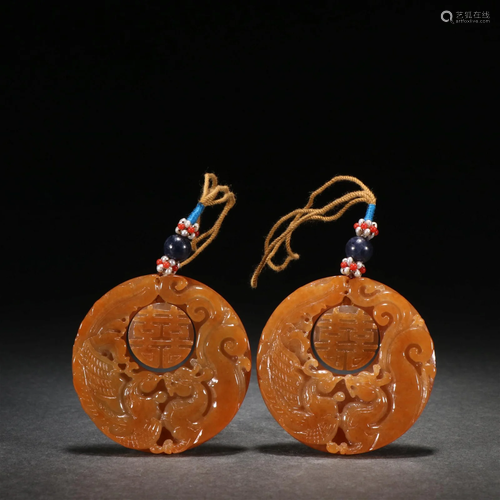 A Pair of Red Nephrite Jade Pendants