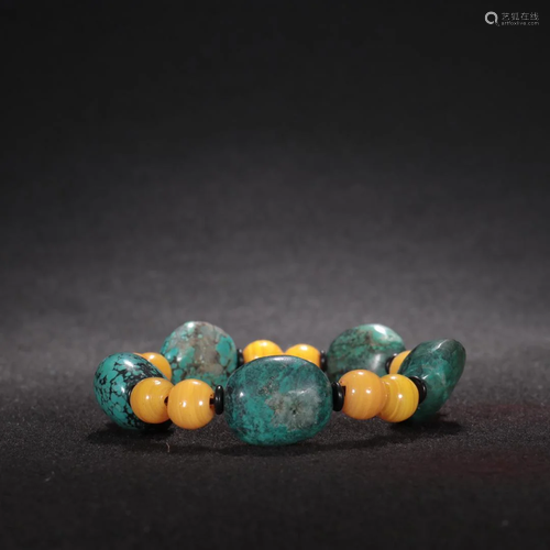 A Turquoise cum Natural Stone Bead Bracelet