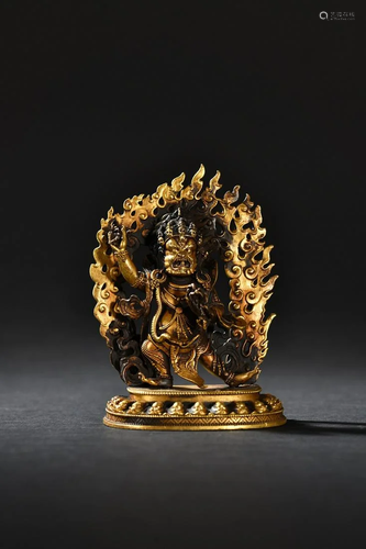 A Gilt Bronze Tibetan Deity Statue