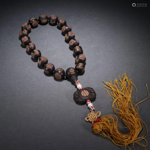 An Agarwood Eighteen Bead Bracelet