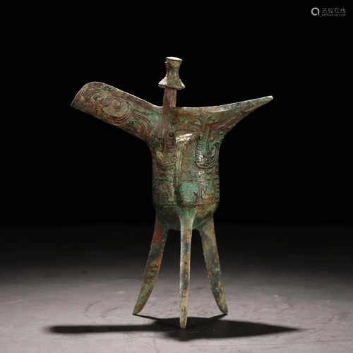 A Bronze Tripod Vessel