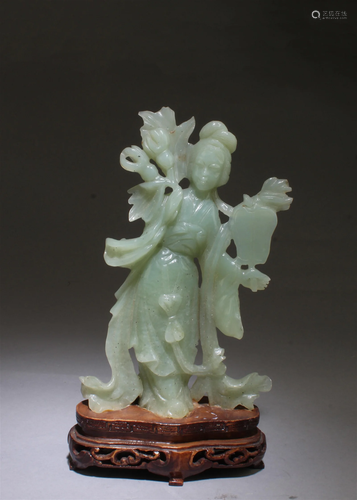 A Carved Jade Maiden Figurine