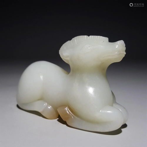 A Carved Hetian Mythical Beast Figurine